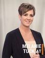AT, Melanie Tuck